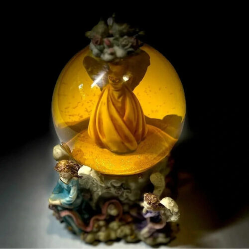 Sankyo vintage Musical snow globe featuring angels on the outside and inside.